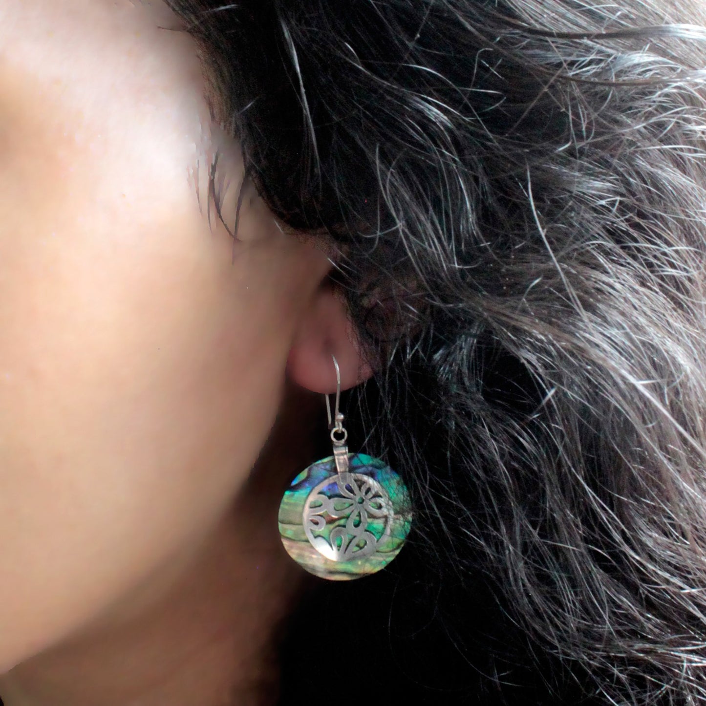 Stylish Shell earrings featuring silver flower design, handcrafted in Bali, perfect for any occasion.