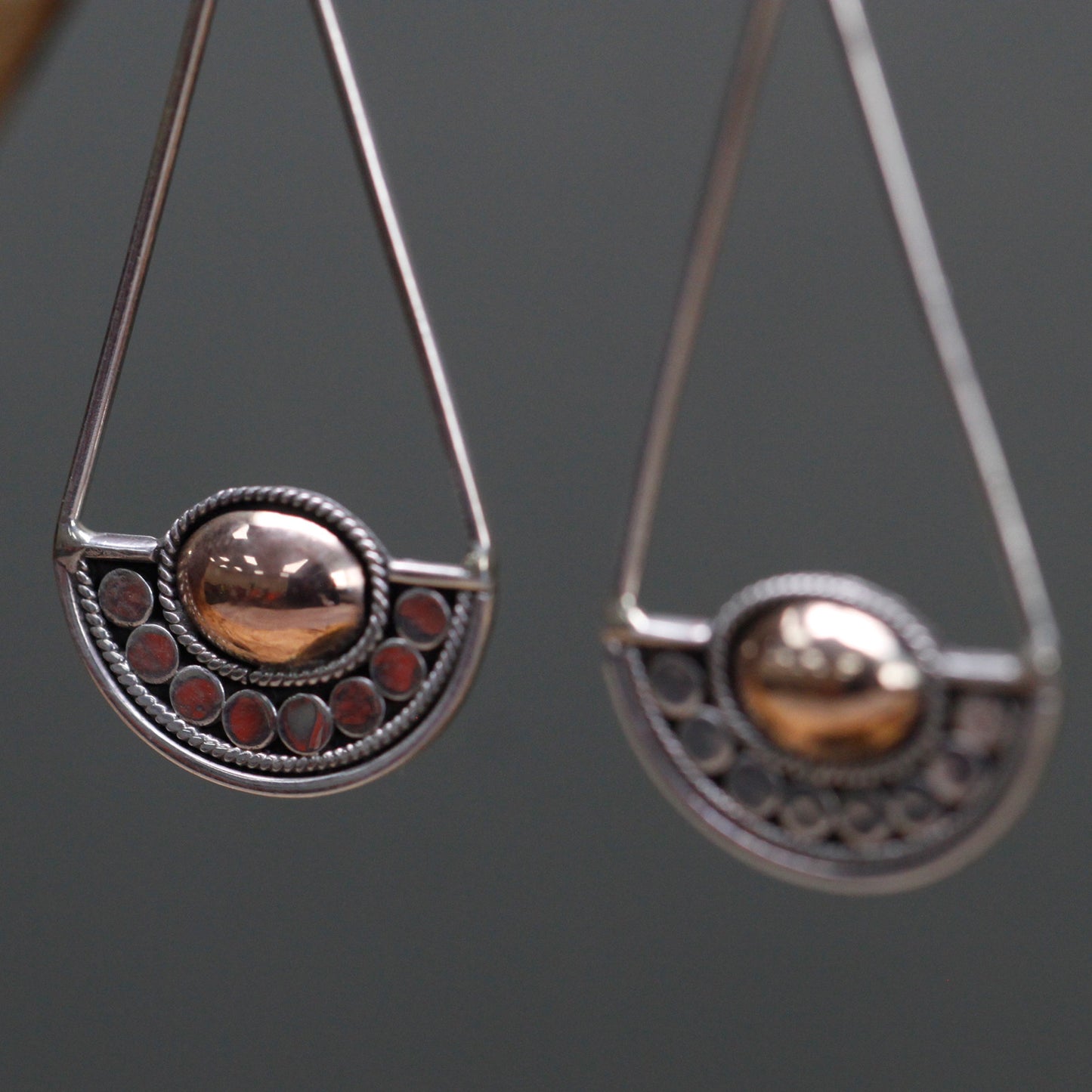 Elegant Silver and 18ct Gold earrings from Luna Balance, featuring a stylish hook design and unique detailing.