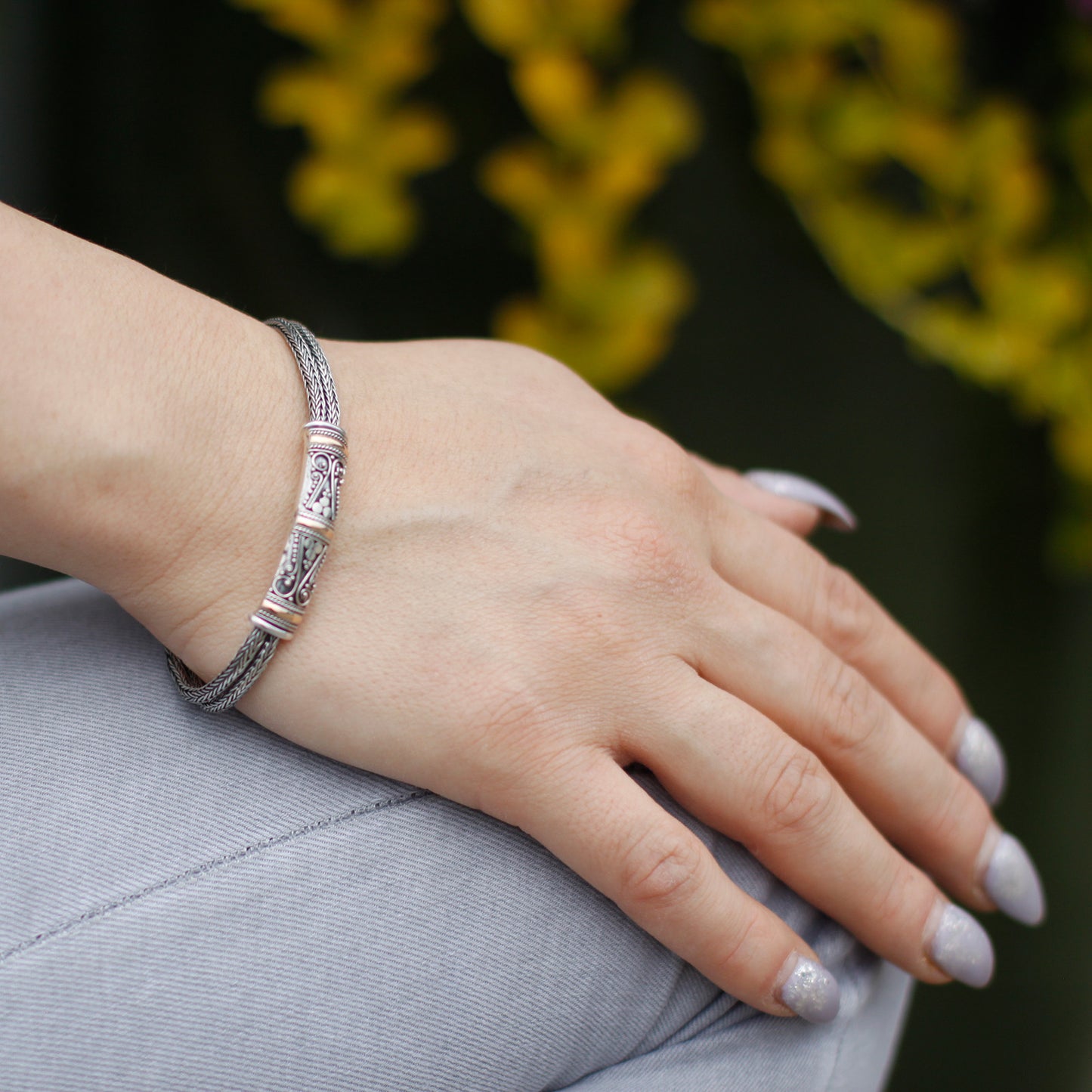 Stylish unisex Silver & Gold bracelet showcasing a twin chain design, perfect for gifting or personal wear.