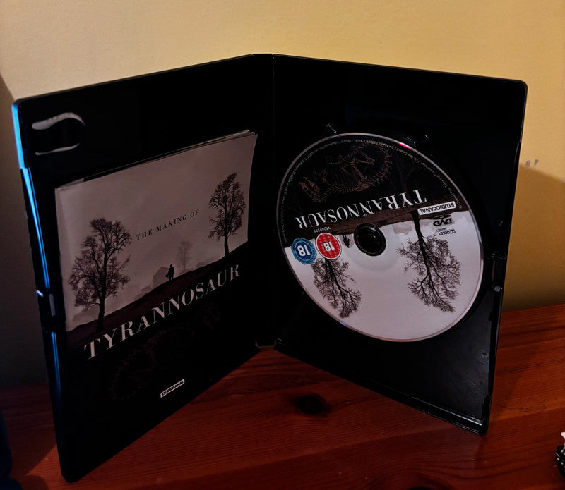 Tyrannosaur - DVD Olivia Colman displayed in its case, showcasing the powerful drama film's captivating design.