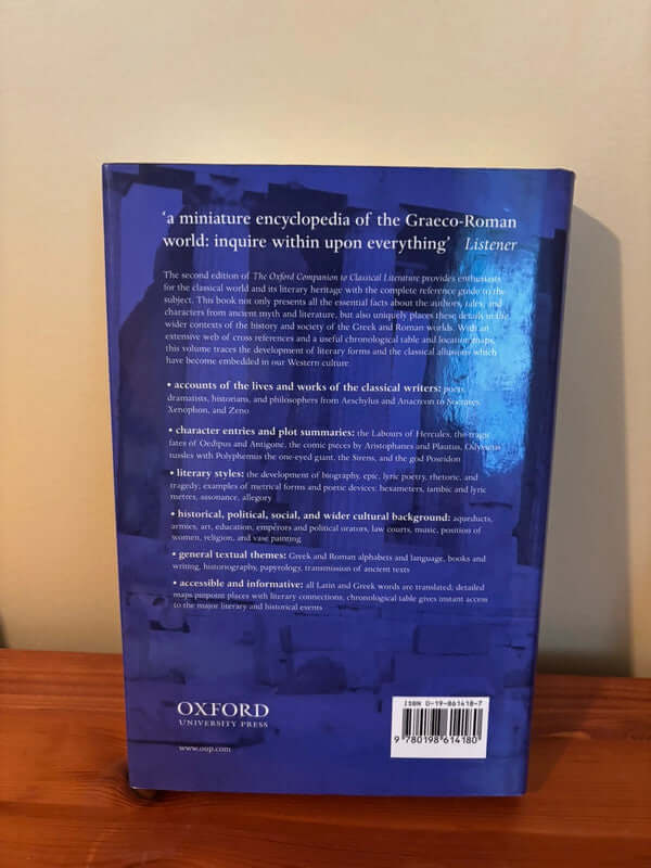 Back cover of The Oxford Companion to Classical Literature by M C Howatson, essential for classical literature enthusiasts.