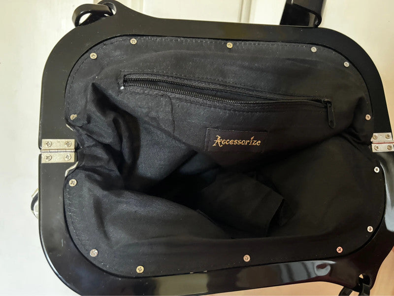 Stylish Accessorize small evening shoulder bag, perfect for parties or weddings, featuring a black and white design.