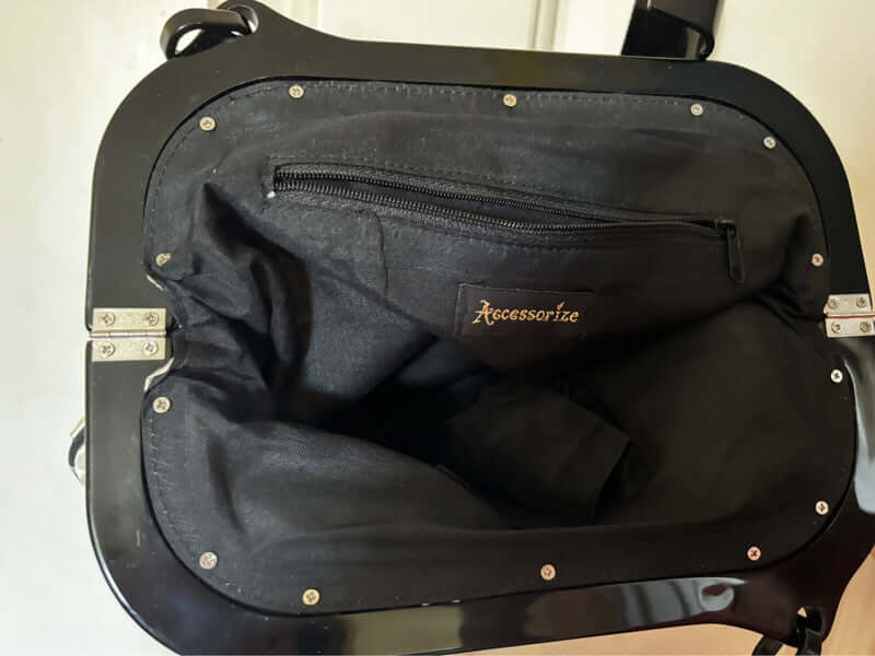 Stylish Accessorize small evening shoulder bag, perfect for parties or weddings, featuring a black and white design.