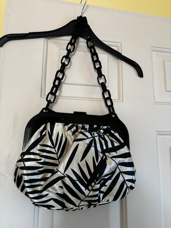 Stylish Accessorize small evening shoulder bag in black and white, perfect for parties and special occasions.