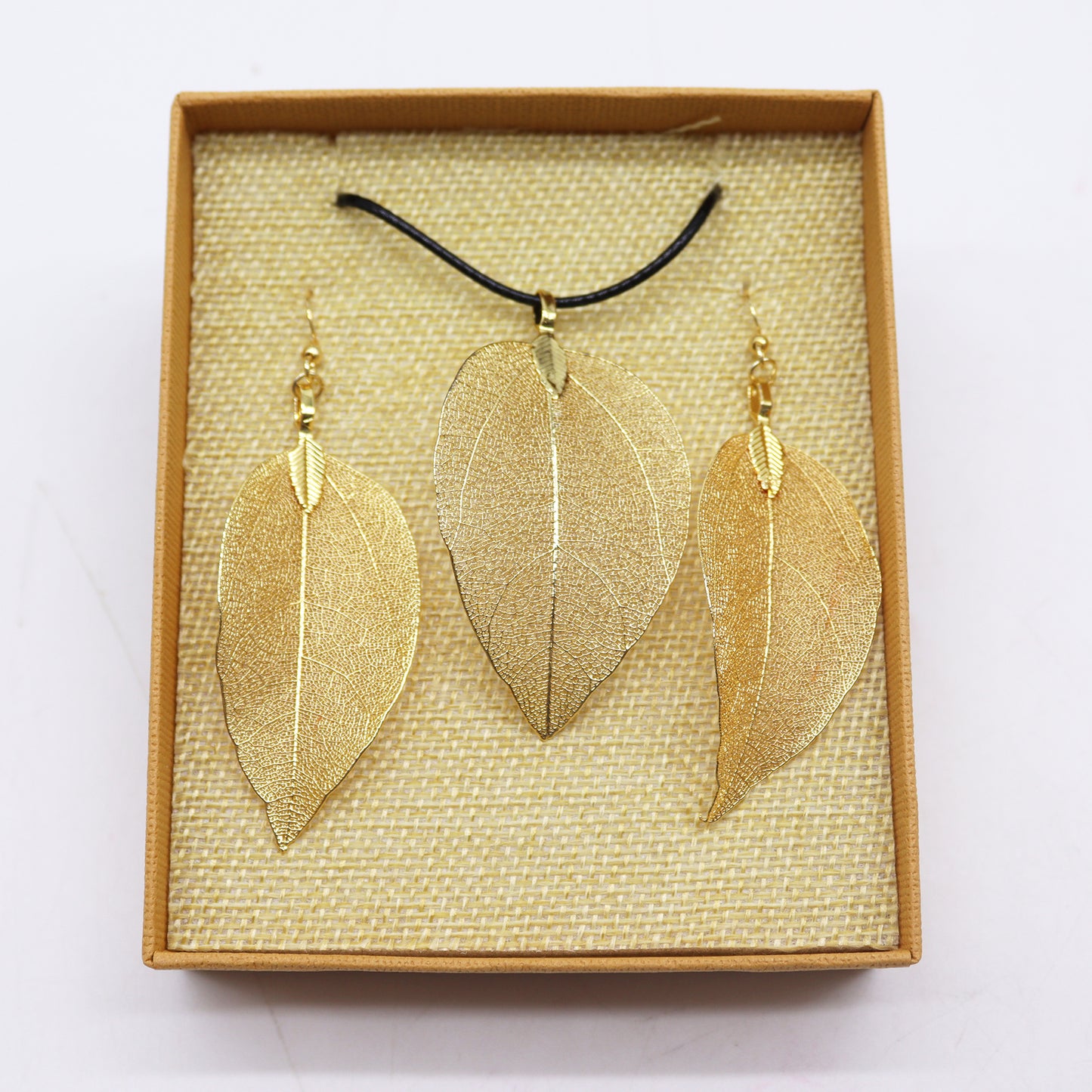 Gold Necklace and earring set featuring electro-plated real leaves, perfect for unique gifts.