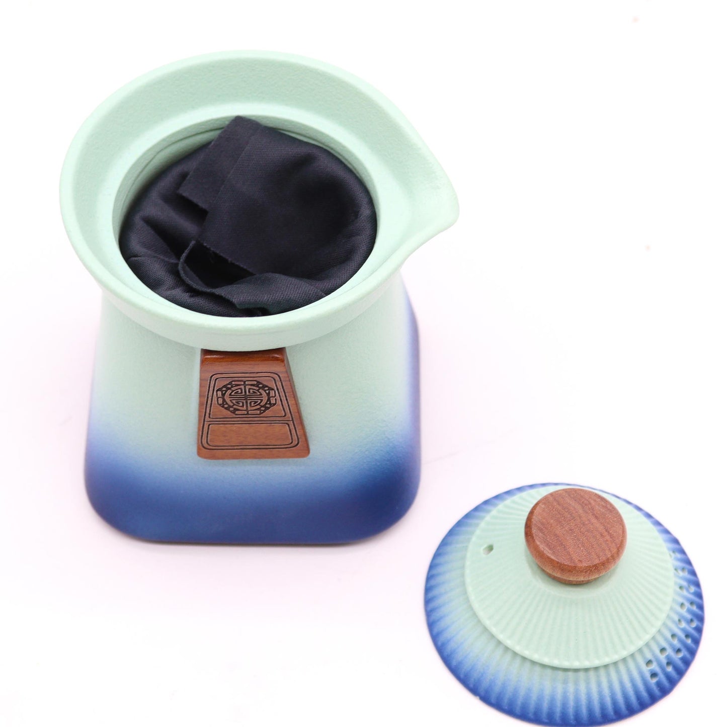 Ceramic Temple Teapot Set in Blue Heaven, complete with three cups, perfect for elegant tea moments.