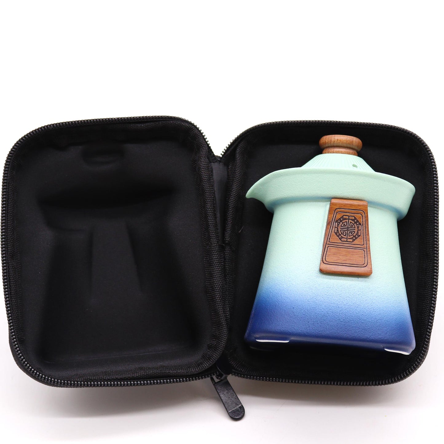 Ceramic Temple Teapot Set in Blue Heaven, elegantly displayed in a sleek black case, perfect for tea lovers.