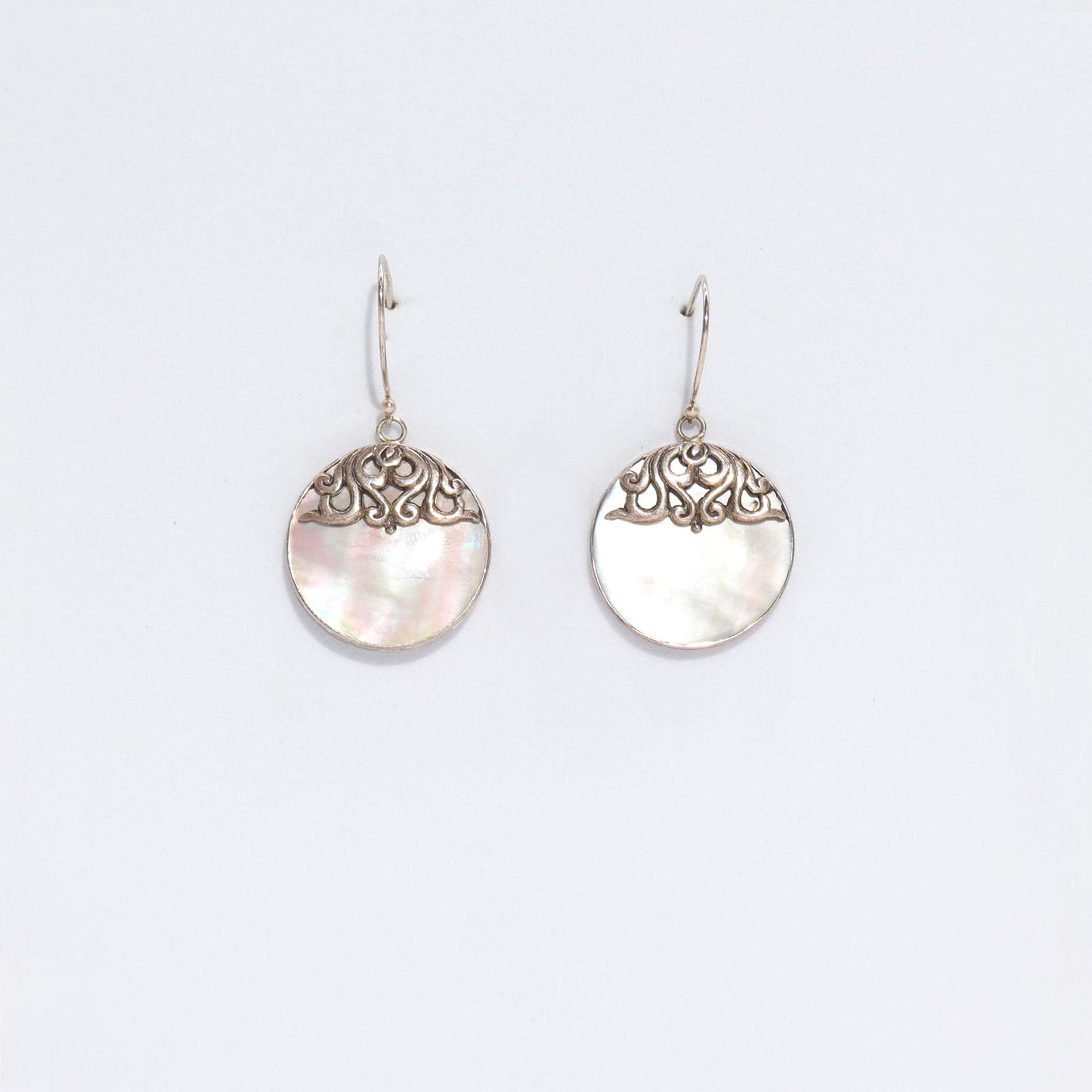 Elegant Shell & Silver Earrings - Classic Disc showcase unique craftsmanship, perfect for adding charm to any outfit.