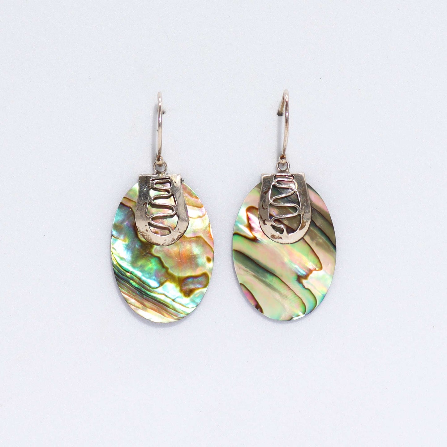 Stunning Shell & Silver Earrings featuring iridescent abalone, handcrafted with care in Bali for a unique accessory.