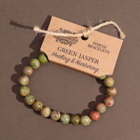 Elegant Power Bracelet - Green Jasper, designed to absorb negative energy and enhance your style effortlessly.