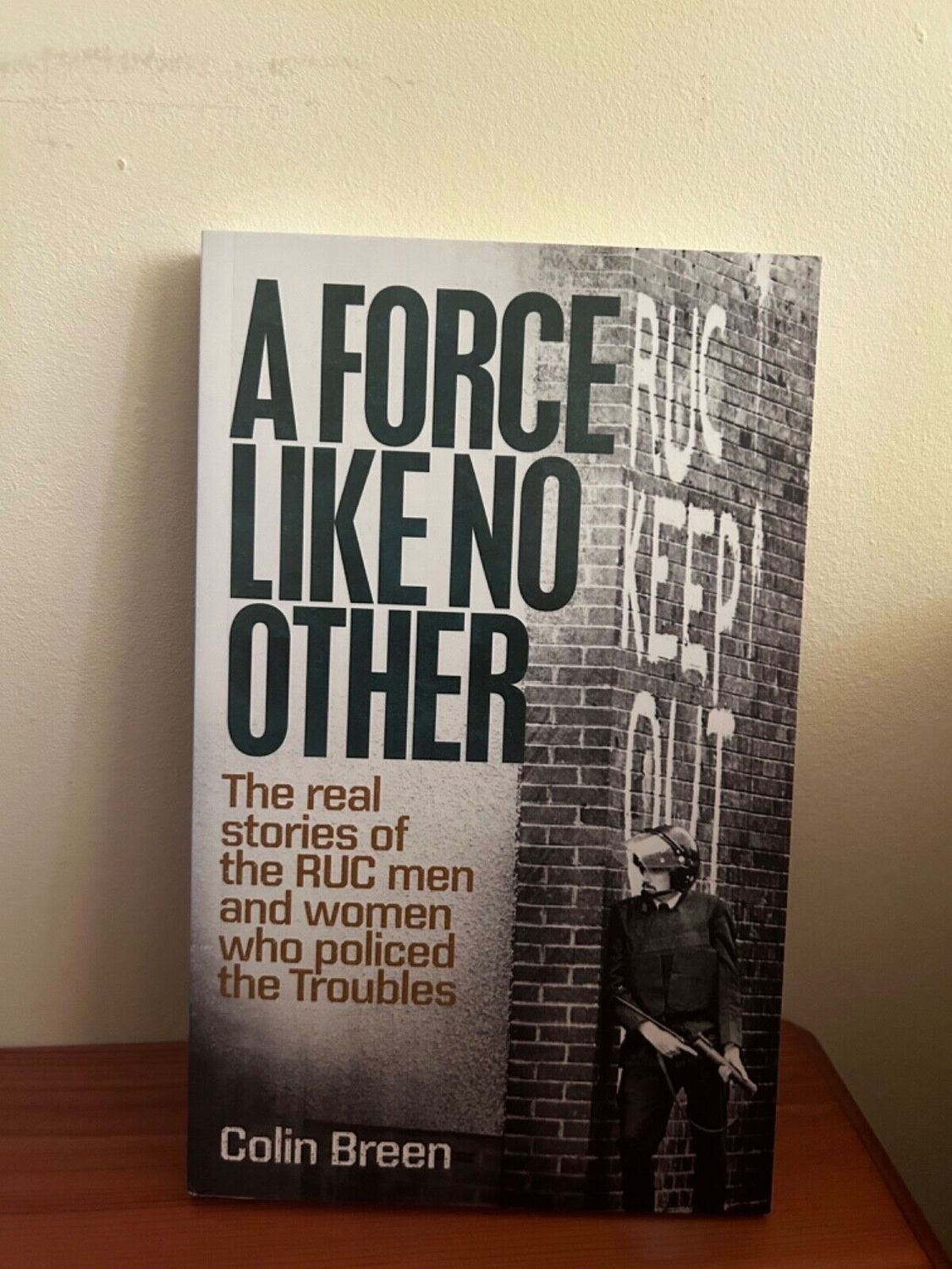 Discover "A Force Like No Other: (Book) The real stories of the RUC men and women who policed the Troubles..." at your store.