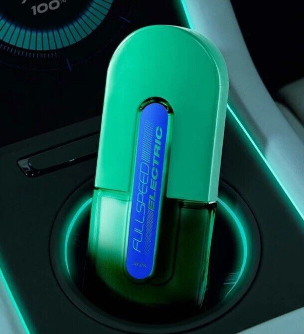 Avon Full Speed Electric for Him 75ml fragrance displayed in a sleek car cup holder, embodying dynamic energy.