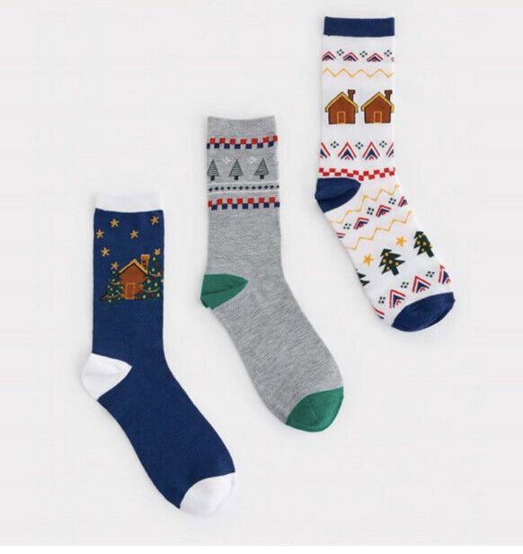Brighten your Christmas with Avon Boxed Men's Festive Crew Socks, featuring three vibrant, festive designs.