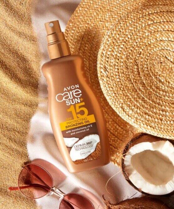 Avon Care Sun Protecting Bronzing Oil offers sun protection and a radiant glow on a summer backdrop with accessories.