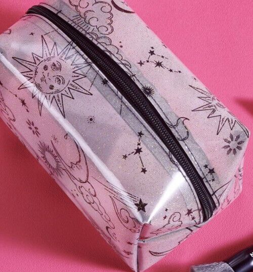 Avon Ella Cosmetic Bag features a celestial design with glitter, perfect for stylish beauty routines.