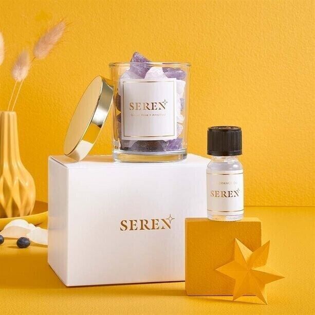 Avon Crystal Diffuser and Oil Gift Set showcasing elegant stones for a serene home atmosphere. Perfect for self-care.