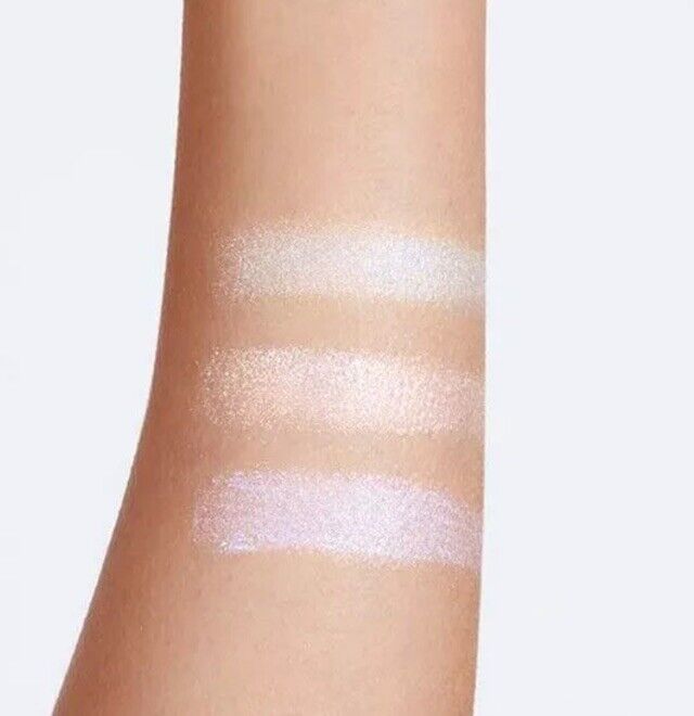 Swatches of Avon Sunset Beats Glitter Toppers Eyeshadow showcasing iridescent shades for stunning day-to-night looks.