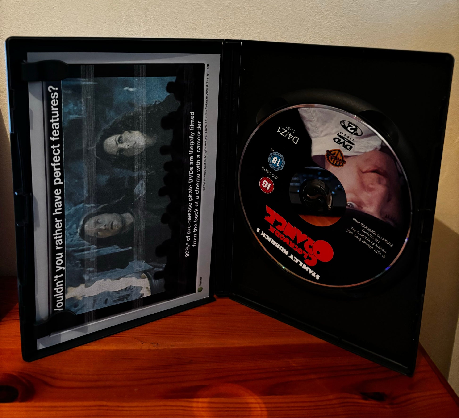 Clockwork Orange (DVD) features striking artwork and the iconic disc, perfect for collectors and film enthusiasts.