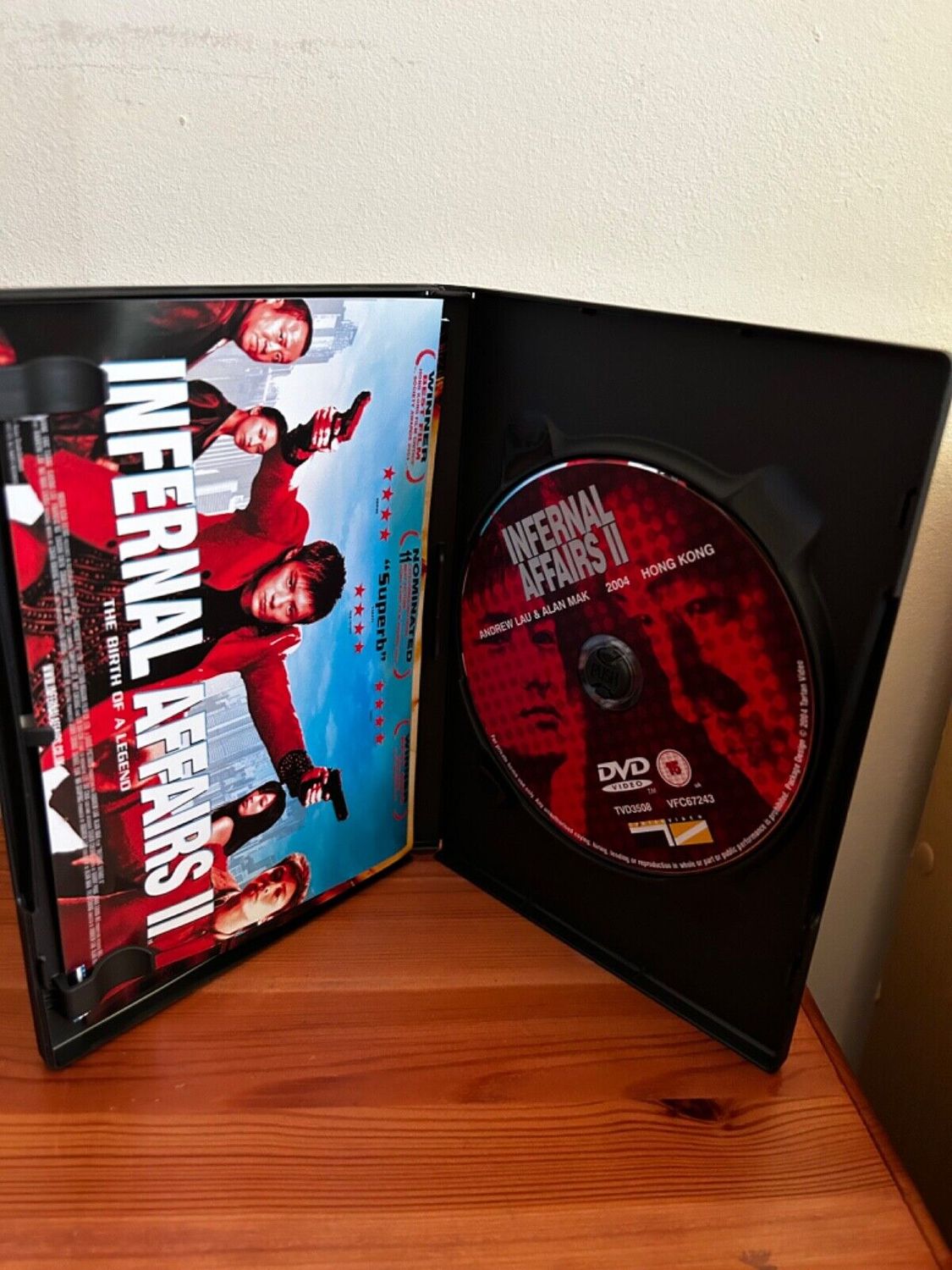 Infernal Affairs - The Trilogy (DVD, 2005) showcases all three films in this acclaimed thriller series.