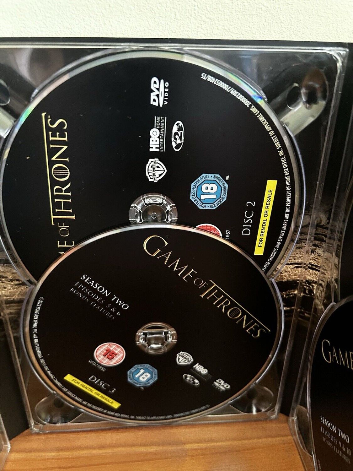 Complete DVD box set of Game Of Thrones - Season 1, featuring gripping episodes and intense drama from Westeros.