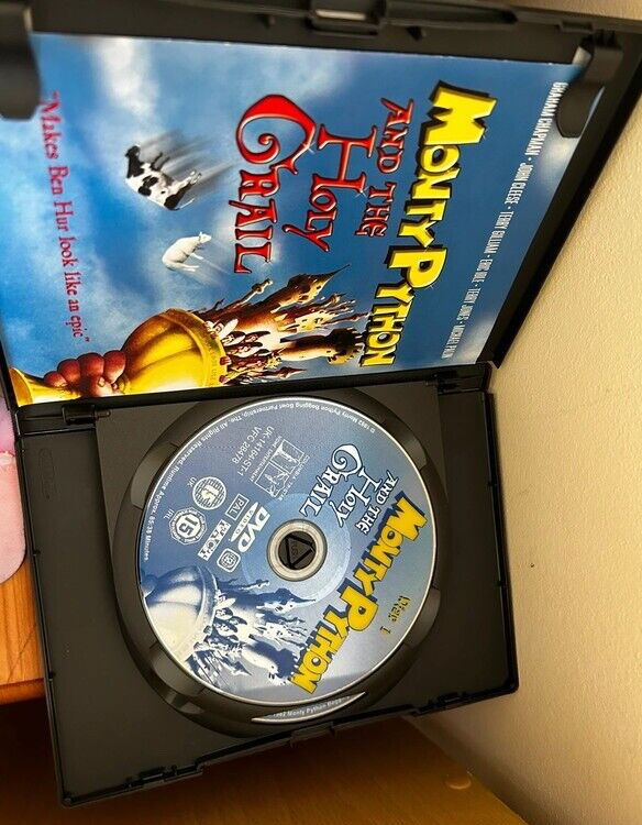 Monty Python And The Holy Grail (DVD) showcases the iconic film's disc and artwork in a stylish collection.