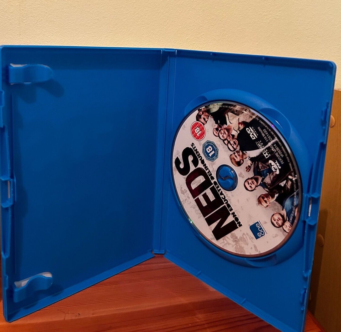 Neds Connor Mcarron 2011 DVD inside blue case, perfect for drama fans seeking a gripping cinematic experience.