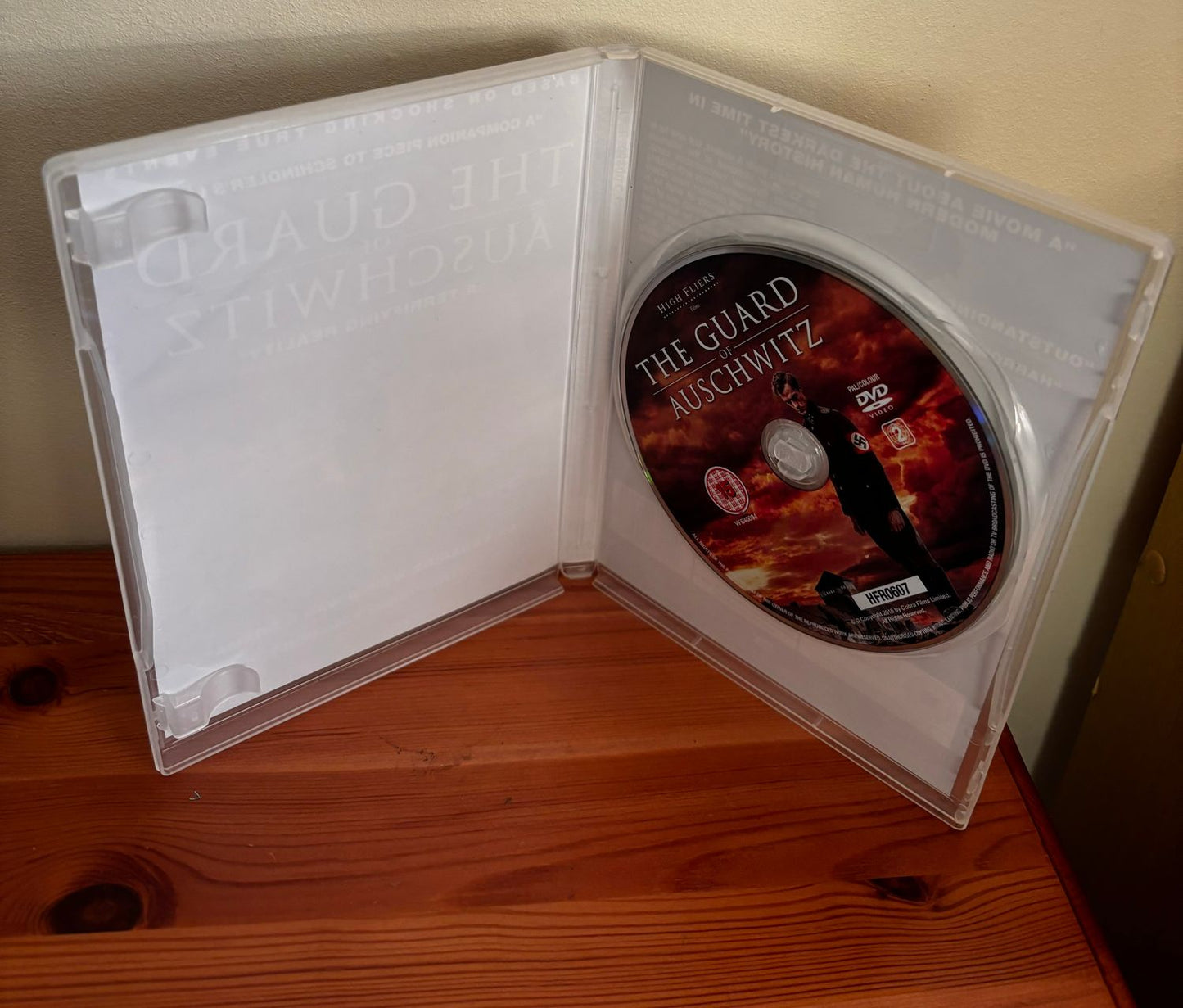 The Guard of Auschwitz (DVD, 2019) displayed in its case, showcasing a gripping tale of history and drama.