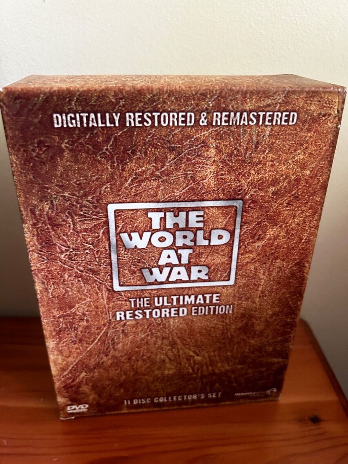The World At War (Box Set) (DVD) featuring 11 discs, digitally restored and remastered for an iconic viewing experience.