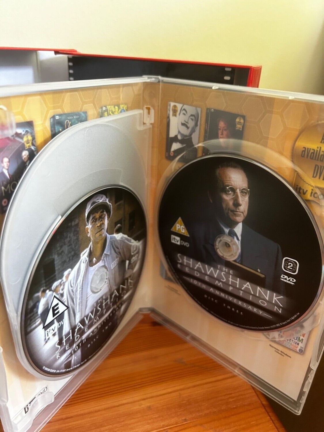 The Shawshank Redemption Special Edition Script Set (DVD) showcasing iconic discs inside a stylish case for collectors.