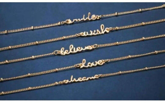 AVON Hazel Bracelet “Wish" ~ Brand New. Christmas Gift, featuring elegant gold-tone metal and inspiring words.