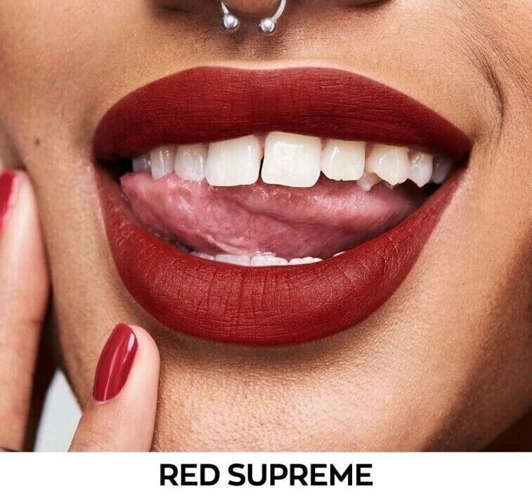 Avon True Colour Perfectly Matte Lipstick in "Red Supreme" delivers vibrant colour for a bold, standout look.
