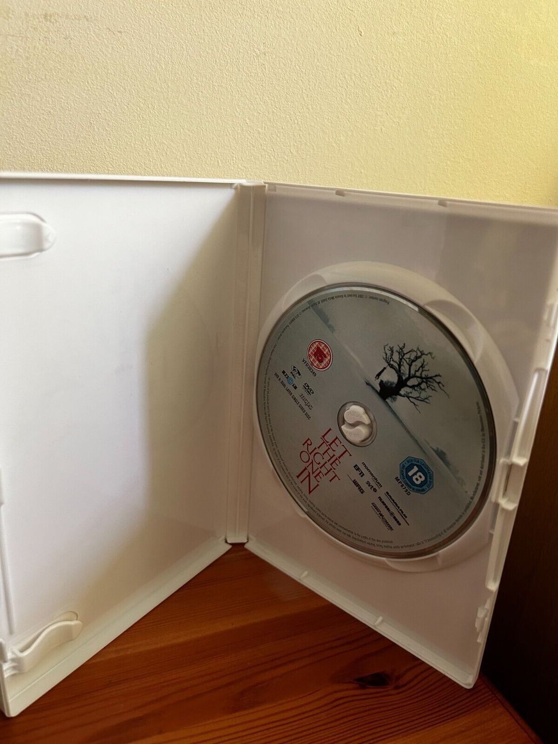 Let the Right One In DVD (2009) Kare Hedebrant, Alfredson (DIR) cert 15, showcases the haunting film's disc inside the case.