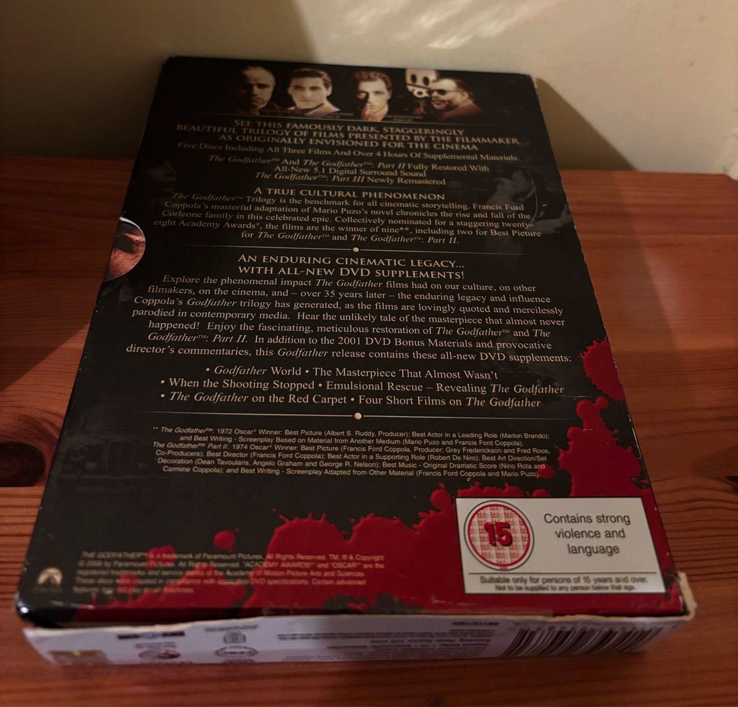 Collectors Edition of THE GODFATHER Films 1-4 (DVD) Box Set, showcasing the legacy of the Corleone family.