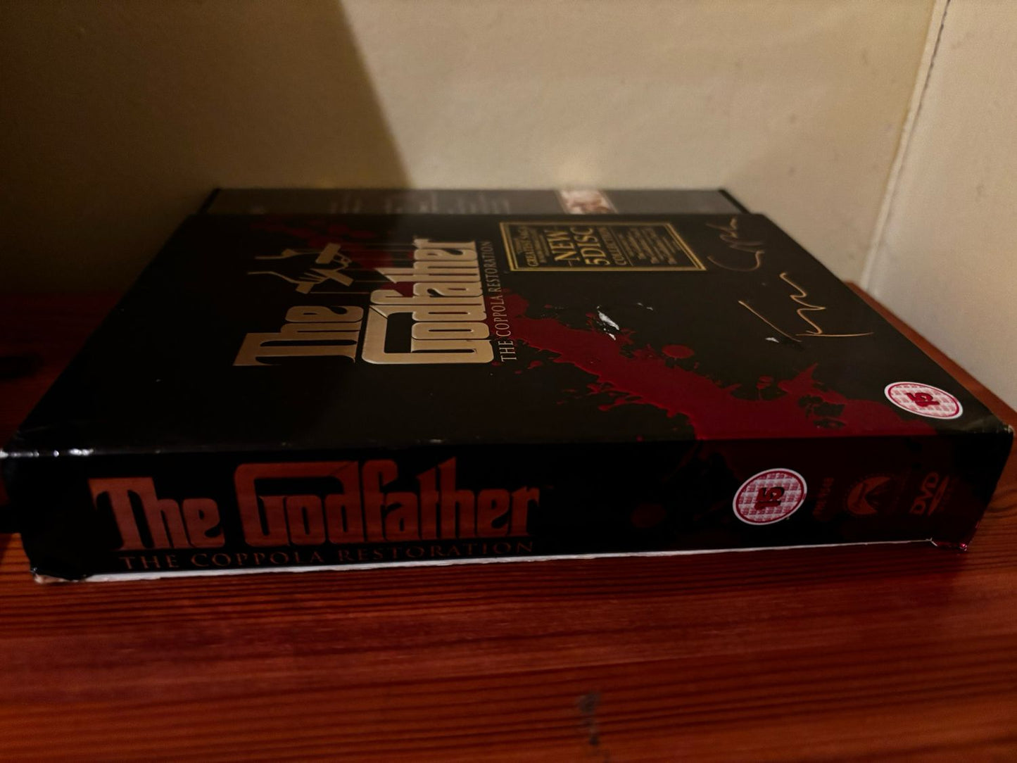 Collector's Edition of THE GODFATHER Films 1-4 (DVD) Box Set, showcasing the iconic Corleone family saga.