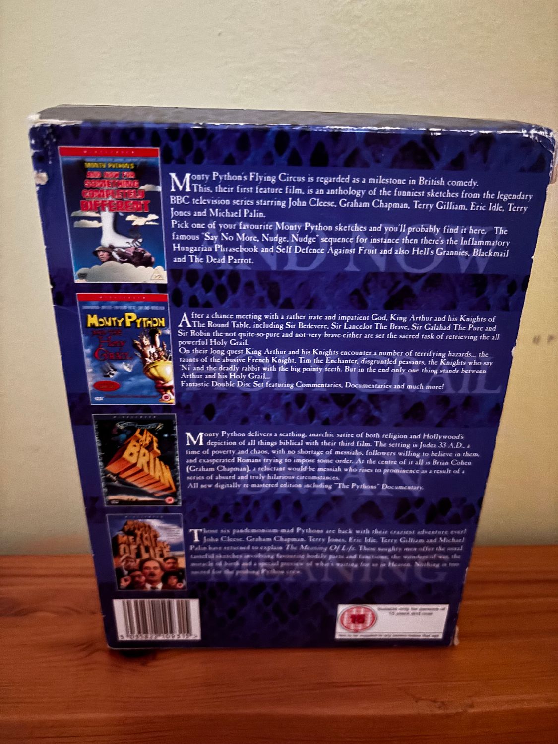 Monty Python - The Movies DVD (2004) John Cleese showcases iconic films in a preloved 5-disc collection for comedy fans.