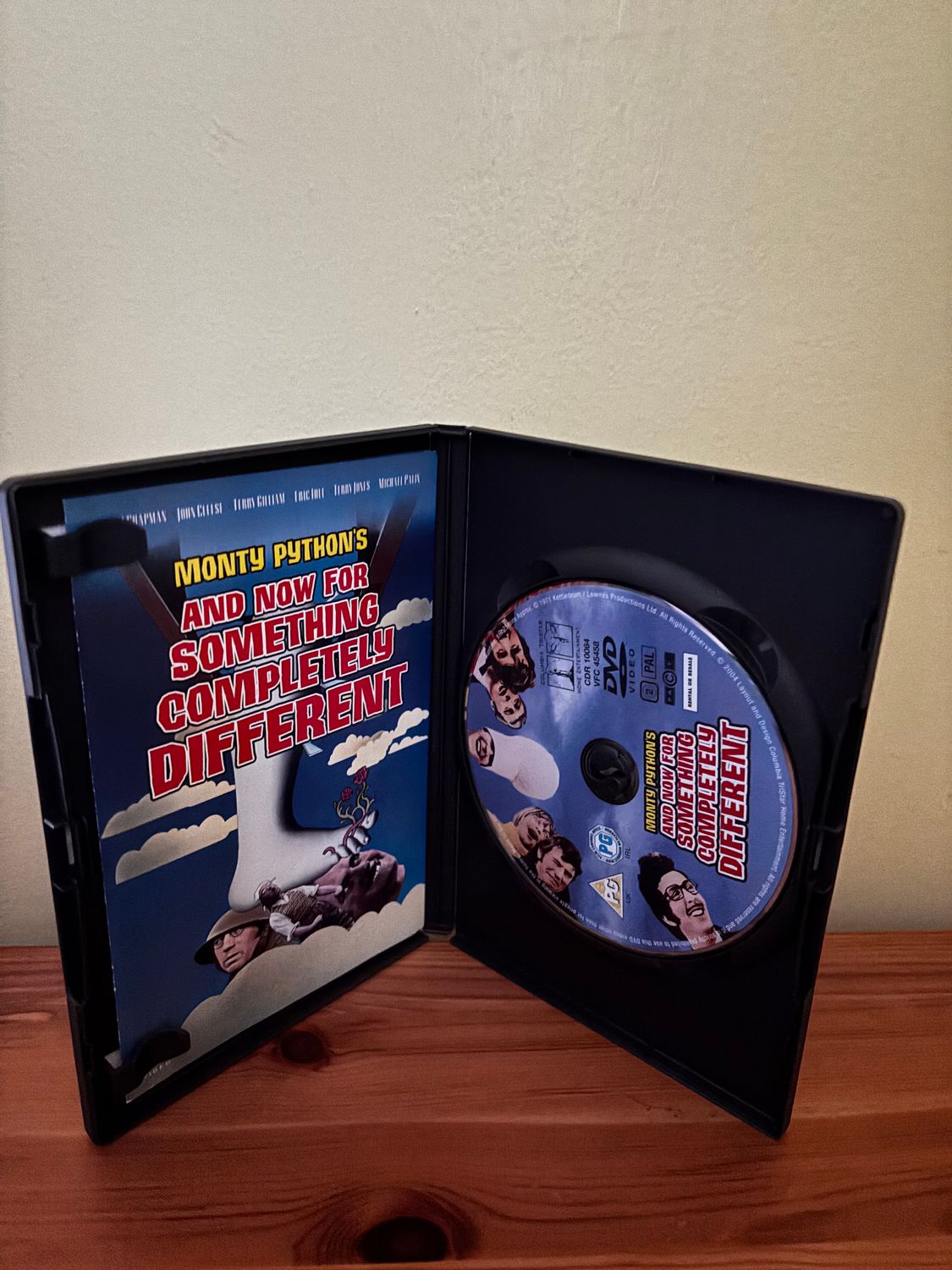 Monty Python - The Movies DVD (2004) John Cleese showcases classic comedy in a preloved 5-disc collection.