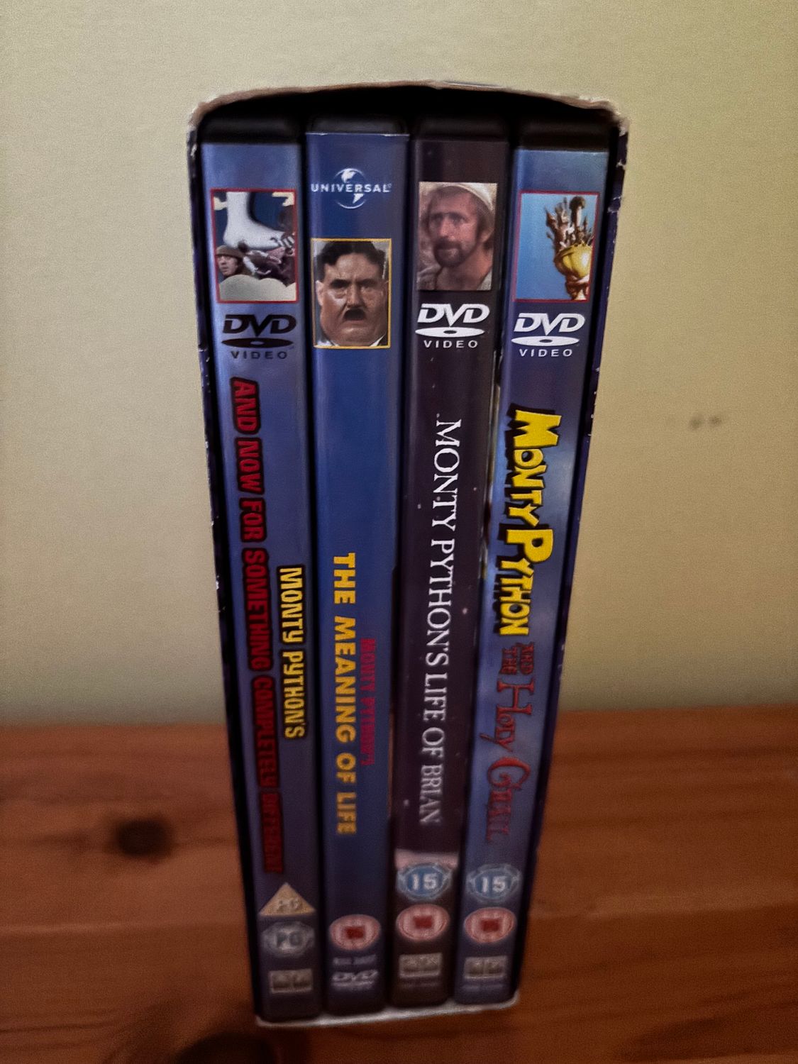 Monty Python - The Movies DVD (2004) John Cleese features classic films in a 5-disc collection for comedy lovers.