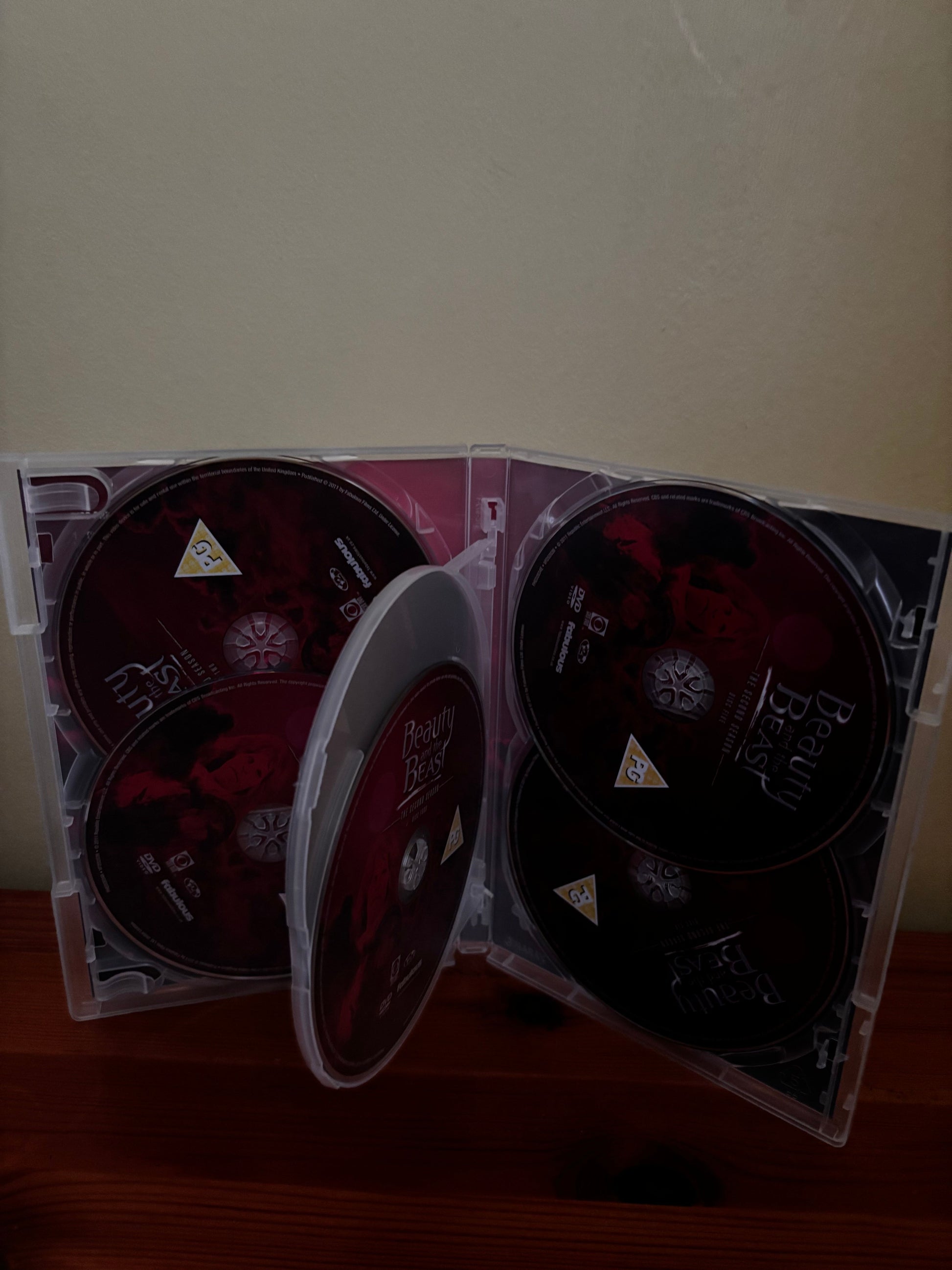 Explore the enchanting Beauty and the Beast Complete Series 1-3 DVD box set, featuring all 16 captivating discs.