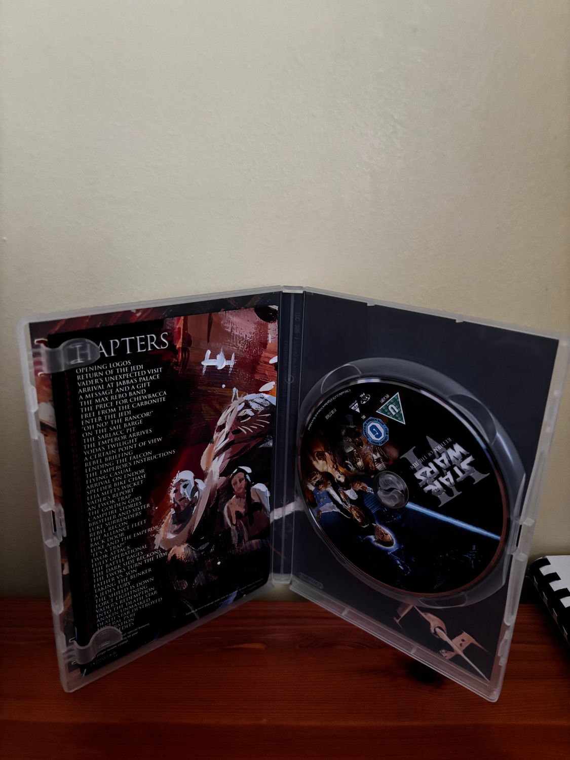 Star Wars Trilogy: Episodes IV, V and VI DVD (2006) Mark Hamill, Lucas (DIR) showcases the iconic films' DVD interior.