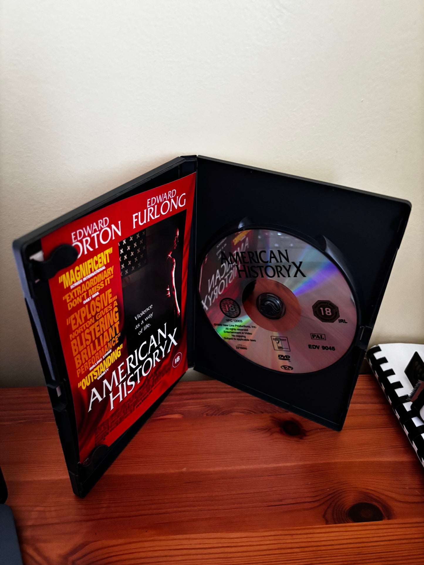 American History X (DVD, 1999) showing the cover and disc, highlighting its themes of racism and redemption.