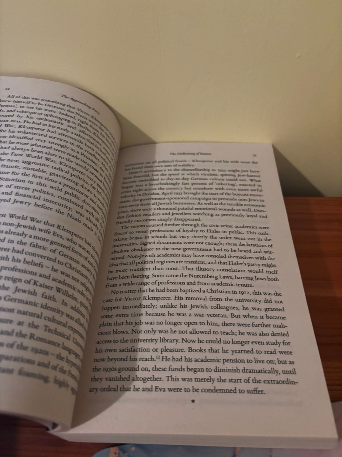 Open pages of Dresden: The Fire and Darkness - Paperback, exploring war's haunting narrative by Sinclair McKay.