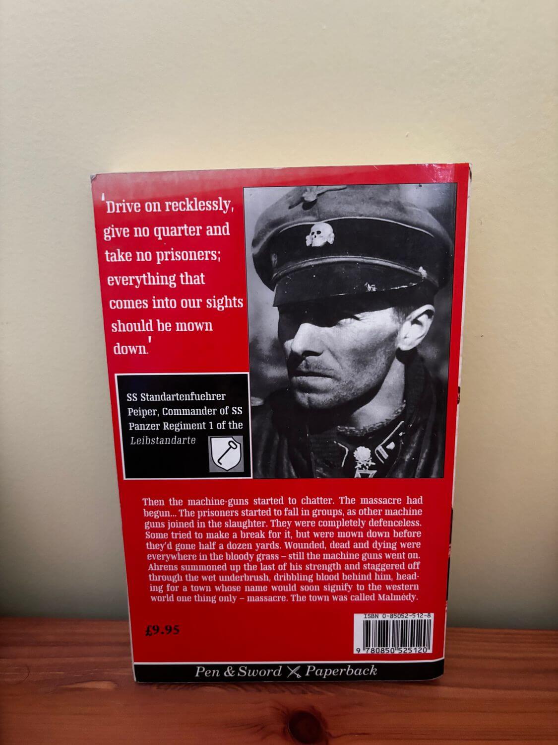 Explore the gripping narrative of the Massacre at Malmedy (Pen & Sword paperback) by Charles Whiting, a haunting WWII account.