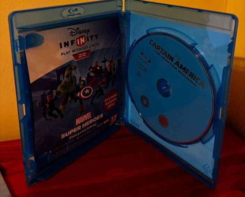 Captain America: The Winter Soldier Blu-ray (2014) Chris Evans in a vibrant blue case, perfect for any Marvel fan.