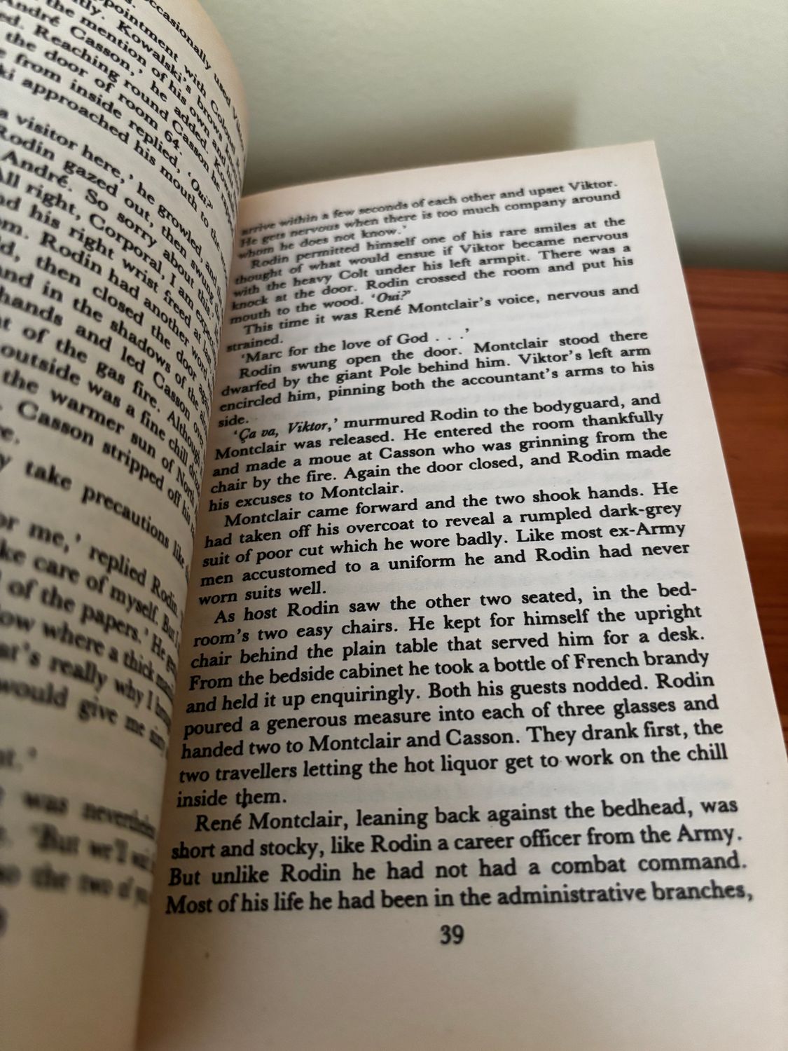 Open pages of the Day of the Jackal -Frederick Forsyth paperback, revealing gripping espionage narratives at your favourite bookstore.