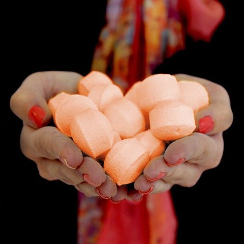 1.3Kg Box of Chill Pills (Mini Bath Bombs) - Fresh Oranges offers vibrant citrus scents, perfect for an invigorating bath experience.