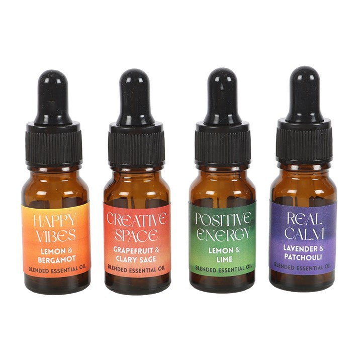 The Happy Collection Blended Essential Oil Set features four 10ml bottles for your aromatic relaxation needs.