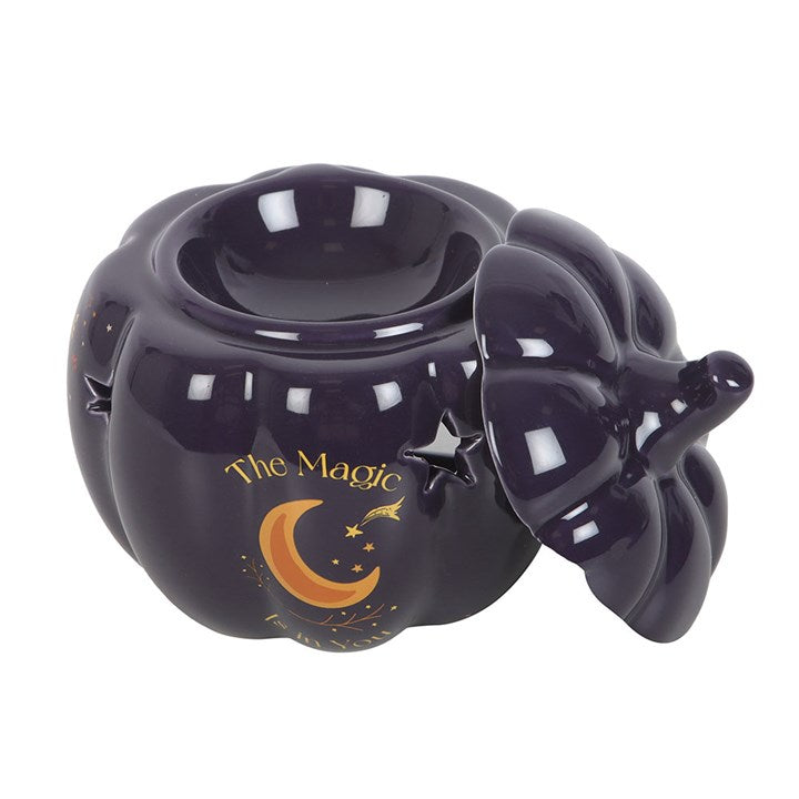 The Magic Is in You Pumpkin Oil Burner features a midnight-blue ceramic design with golden stars and crescent moon.