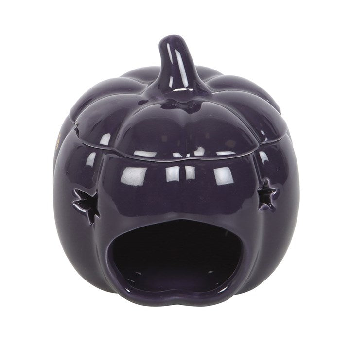 Midnight-blue ceramic The Magic Is in You Pumpkin Oil Burner with golden stars, perfect for a cosy autumn ambience.