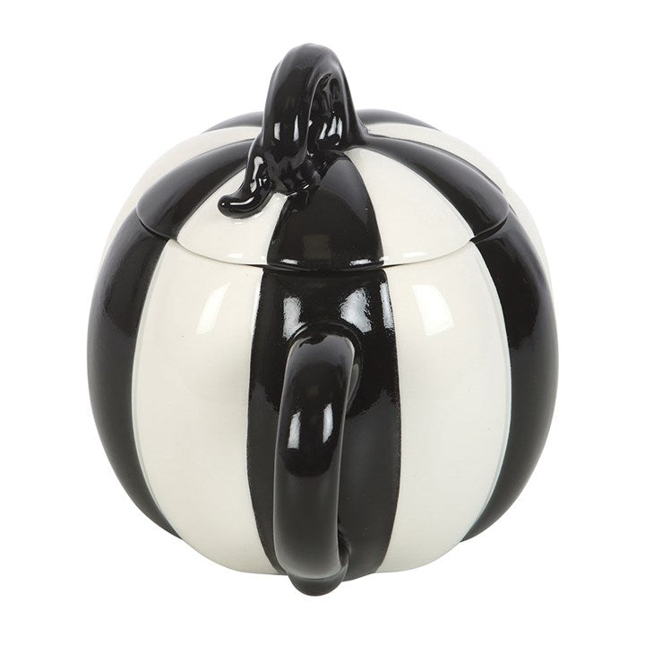 Enjoy hot drinks in the Black and White Striped Pumpkin Lidded Mug, a unique addition to your spooky collection.