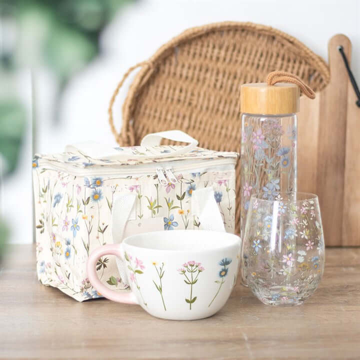 Floral Print Stemless Glass with a charming garden design, perfect for enjoying drinks outdoors in spring sunshine.